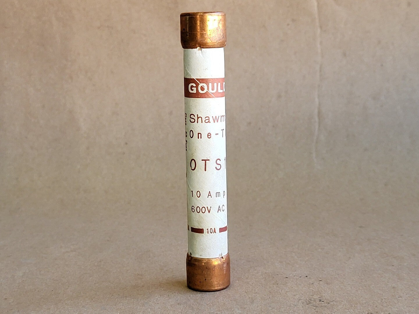 OTS10 The Gould OTS10 is a 10 Amp one-time fuse designed for circuit protection. It features a Class K5 rating.
