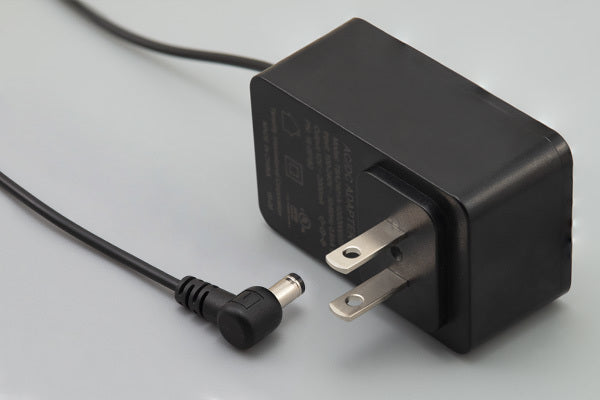16-00218 The Tensility International 16-00218 is a 36W AC/DC wall mount adapter providing a 12Vdc output at 3A. It features Level VI efficiency and a NEMA 1-15P input connector.