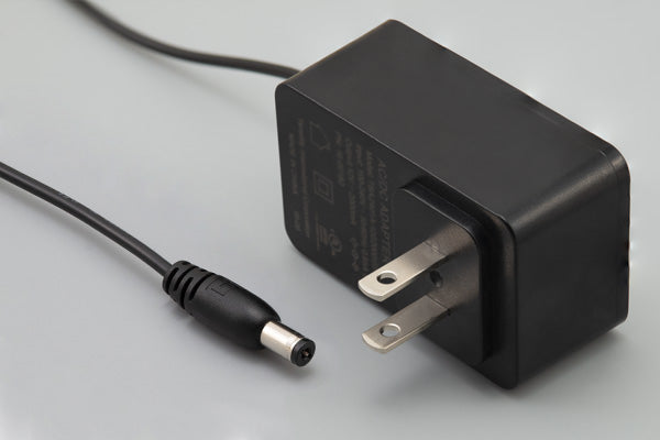 16-00182 The Tensility International 16-00182 is a 24W AC/DC wall mount adapter providing a 12Vdc output at 2A. It meets Level VI efficiency standards.