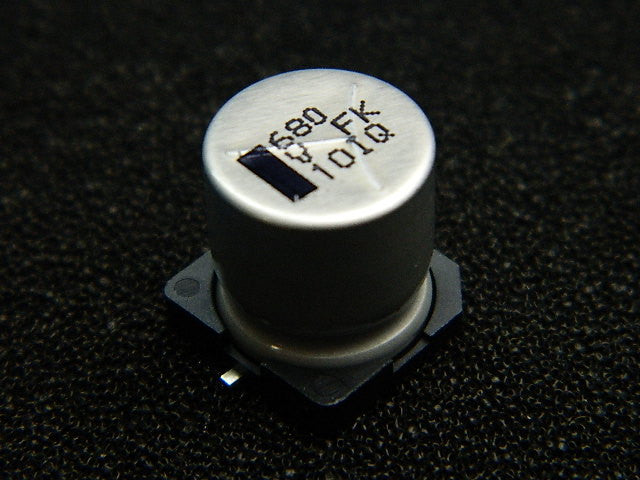 AFK687M35H32T The Cornell Dubilier Electronics AFK687M35H32T is an aluminum capacitor with a capacitance of 680µF and a voltage rating of 35V. It features a 105°C maximum operating temperature and an SMD package.