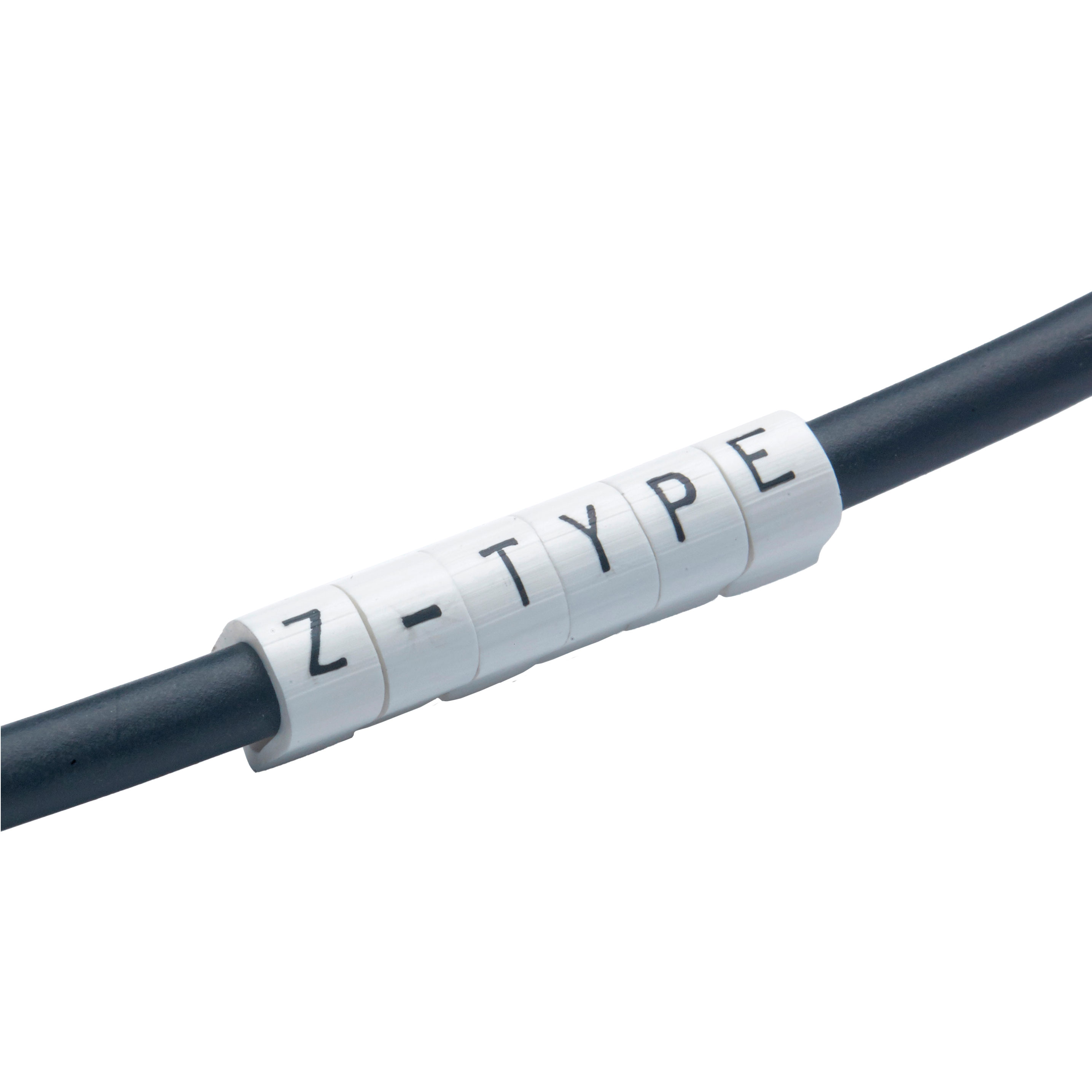 EC1218-000 Push-on wire marker from TE Connectivity (Raychem) in black PVC. Fits cable diameters 0.165" to 0.272" (4.20mm to 6.90mm) with a 0.18" length and legend 0.