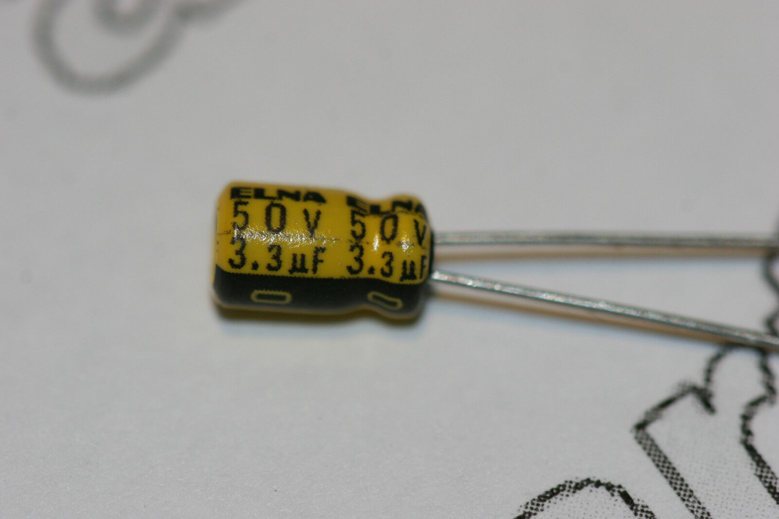 RC2-50V3R3M This Elna RC2-50V3R3M is a radial aluminium electrolytic capacitor with a capacitance of 3.3µF and a voltage rating of 50V. It operates within a temperature range of -40°C to +85°C.