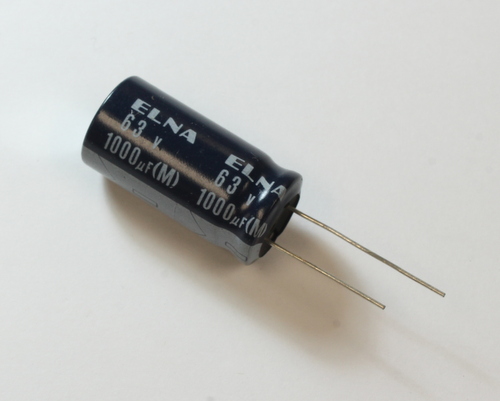 RE2-63V102M The ELNA RE2-63V102M is a radial aluminum electrolytic capacitor. It offers a capacitance of 1,000 µF and a voltage rating of 63 VDC.