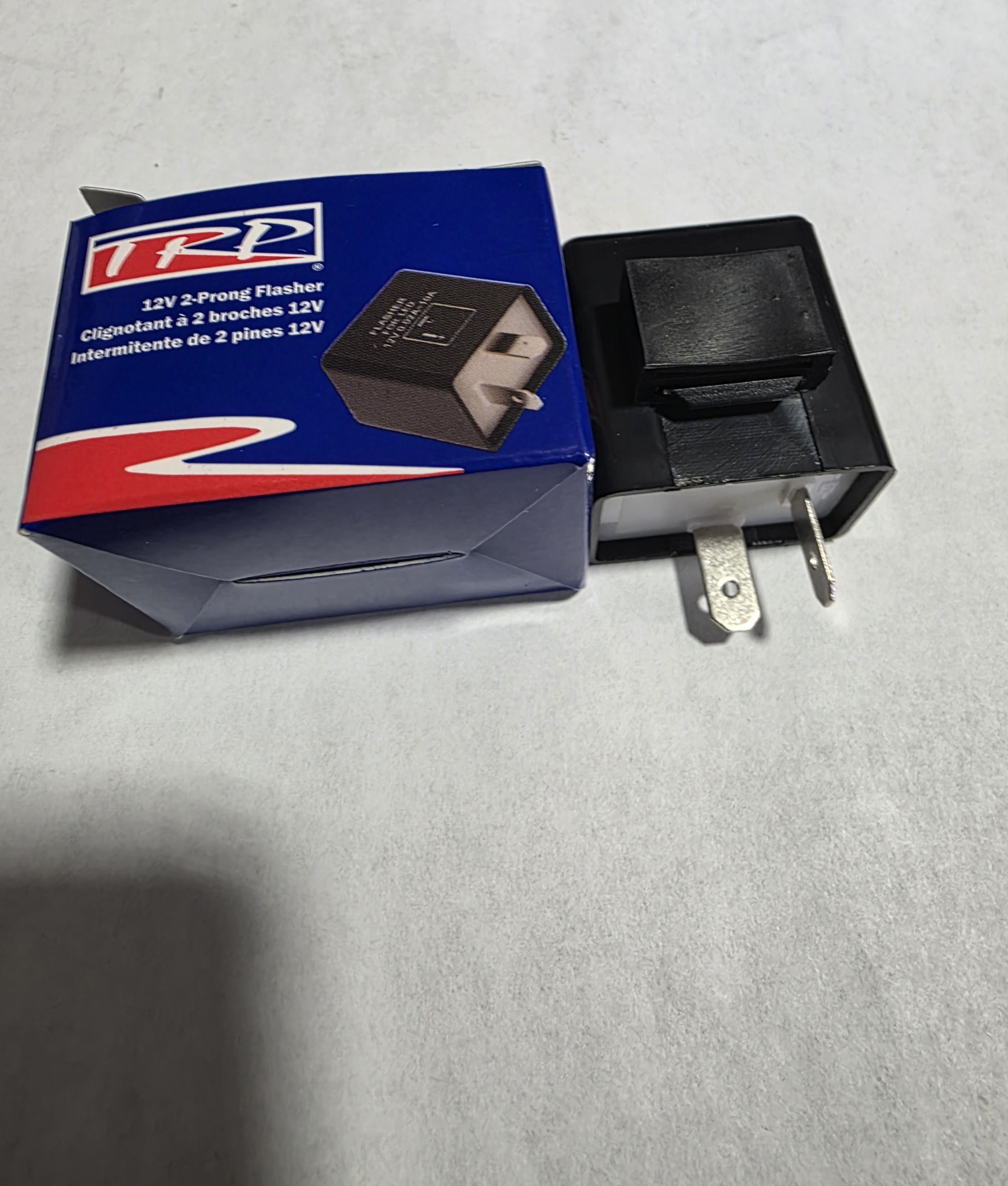 CB1205 This is a genuine TRP/Paccar CB1205TX heavy-duty flasher relay designed for 12-volt negative-ground electrical systems. It maintains an industry-standard 60–120 flashes per minute.