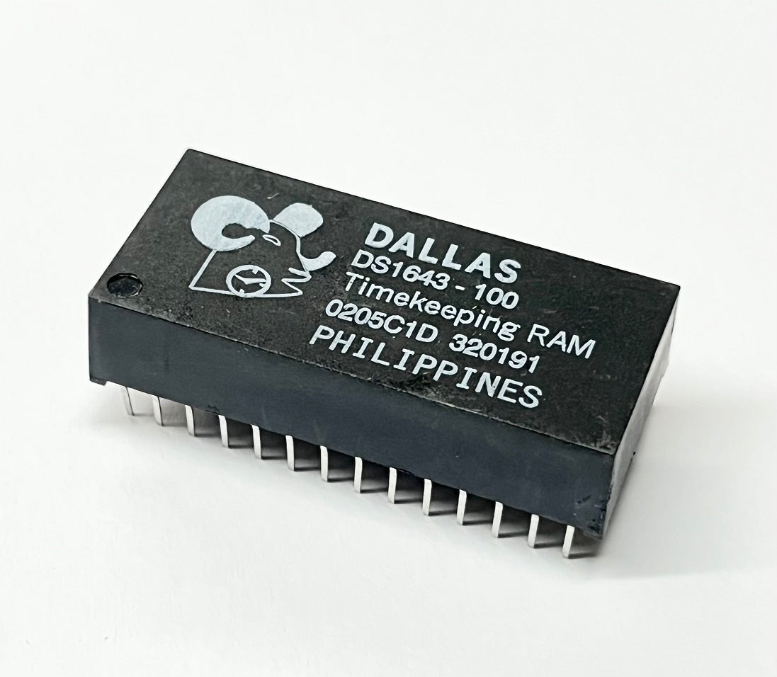 DS1643-100 The DS1643-100 from Dallas Semiconductor is a Real Time Clock (RTC) IC featuring 8KB of NVSRAM and a Parallel interface. It operates from 4.5V to 5.5V and is suitable for through-hole mounting.